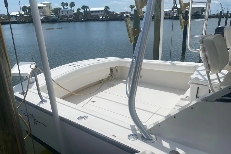 Slide: The Image of 2000 Albemarle 280 Express Fisherman boat docked by the water. - 13