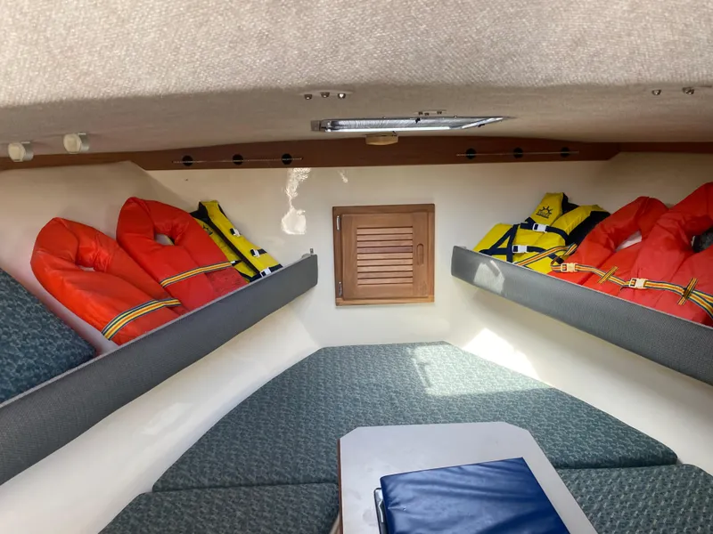 Slide: The Image of Interior of 2000 Albemarle 280 Express Fisherman with life jackets and seating. - 30