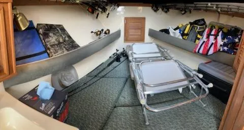 Slide: The Image of Interior of 2000 Albemarle 280 Express Fisherman with fishing gear and seating. - 38