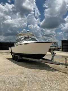 Slide: The Image of 2000 Albemarle 280 Express Fisherman boat on trailer under cloudy sky. - 4