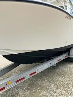 Slide: The Image of 2000 Albemarle 280 Express Fisherman boat on trailer, side view. - 9