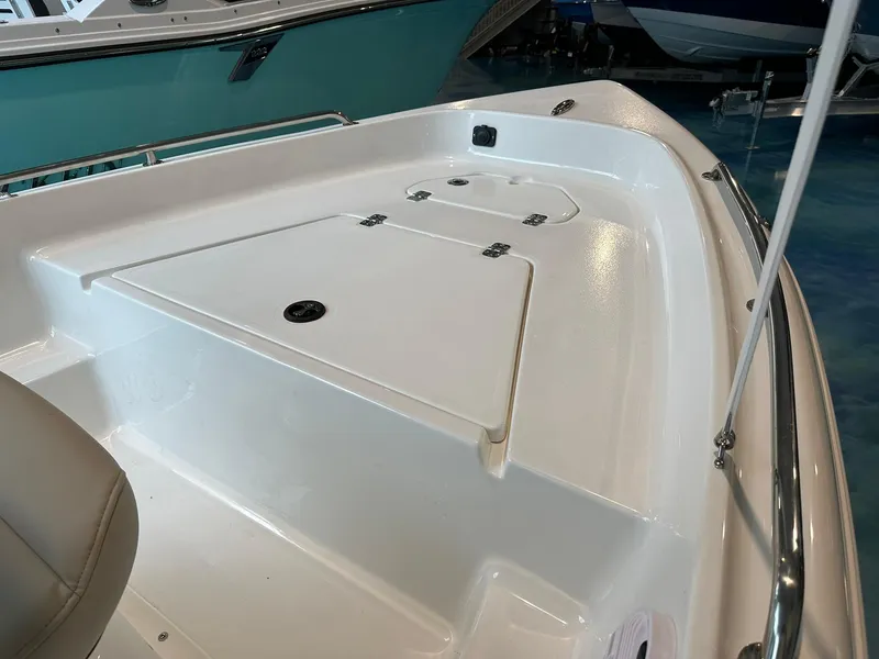 Slide: The Image of 2025 Key West 1720 Center Console boat deck with storage compartments. - 3