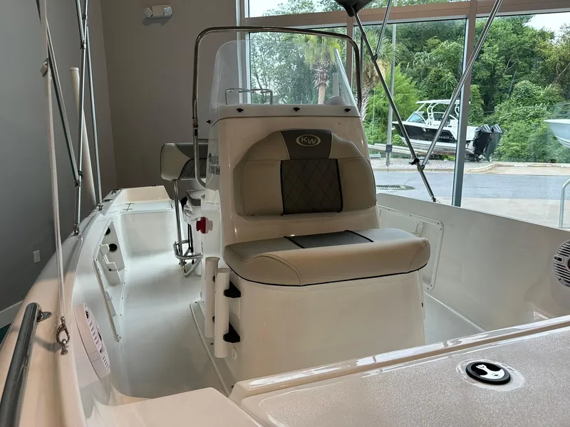 Slide: The Image of 2025 Key West 1720 Center Console boat interior with seating and console view. - 4
