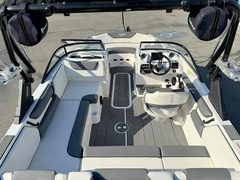 Slide: The Image of 2021 Heyday WT-2 boat interior with modern seating and steering wheel. - 36