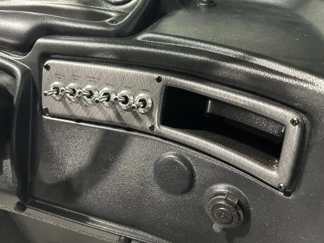 Slide: The Image of Dashboard controls of 2025 Lund 2075 Fisherman Sport boat. - 15