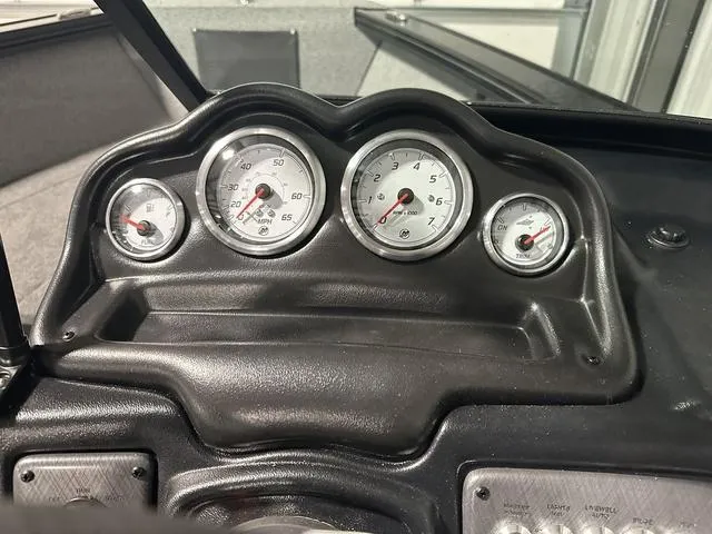 Slide: The Image of Dashboard of 2025 Lund 2075 Fisherman Sport boat with gauges and controls. - 16