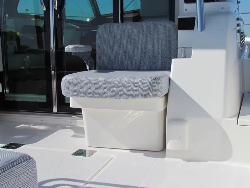 Slide: The Image of Sabre 43 Salon Express 2025 boat seat with modern design and comfortable upholstery. - 14