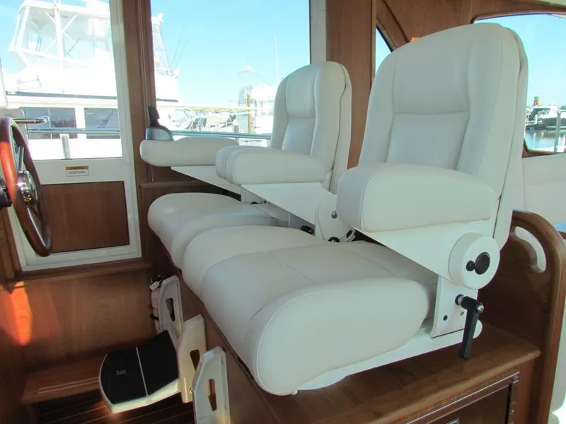 Slide: The Image of Luxurious interior seating of 2025 Sabre 43 Salon Express yacht. - 22