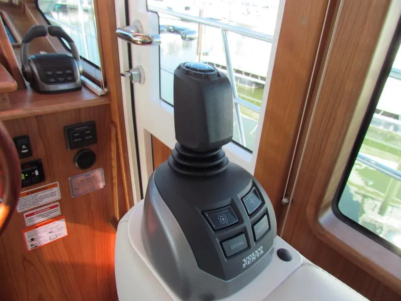 Slide: The Image of Joystick control in 2025 Sabre 43 Salon Express yacht cockpit. - 27