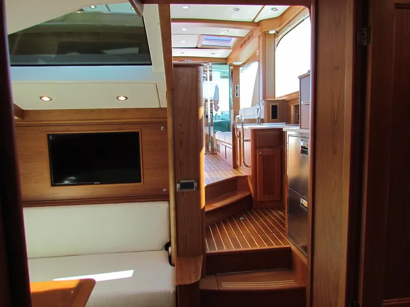 Slide: The Image of Interior of 2025 Sabre 43 Salon Express yacht, featuring luxurious wood finishes and modern amenities. - 33