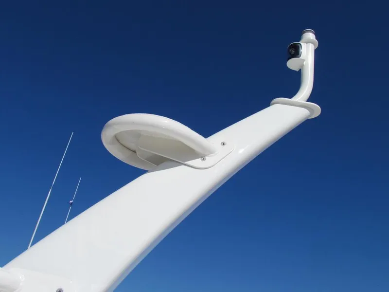 Slide: The Image of Sabre 43 Salon Express 2025 boat mast against clear blue sky. - 61