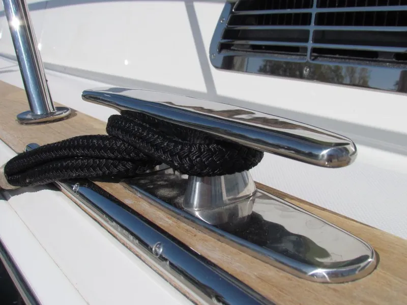 Slide: The Image of Close-up of a cleat with rope on a 2025 Sabre 43 Salon Express yacht. - 64