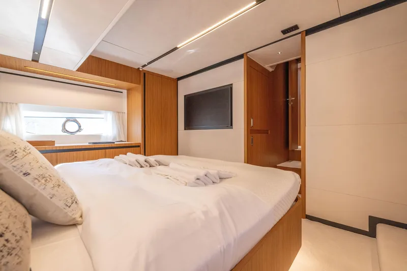 Slide: The Image of Luxurious bedroom interior of 2025 Solaris Power 60 Open yacht, featuring modern design and cozy ambiance. - 33