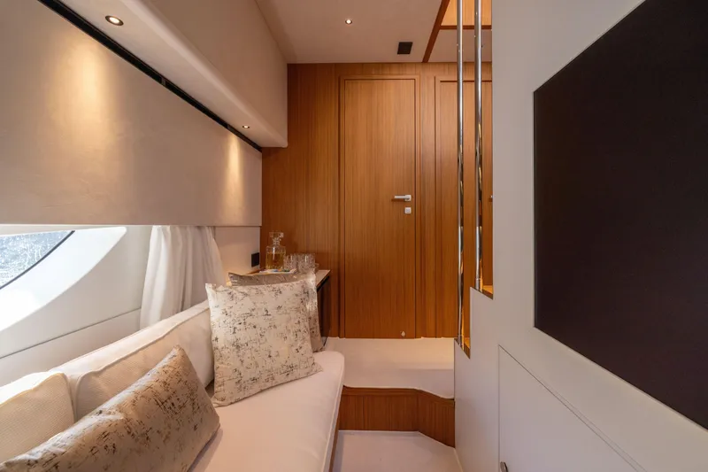 Slide: The Image of Luxurious interior of 2025 Solaris Power 60 Open yacht with elegant wood finishes. - 47