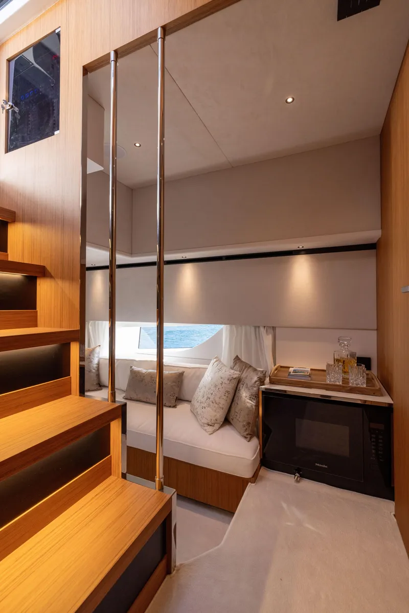 Slide: The Image of Luxurious interior of 2025 Solaris Power 60 Open yacht with modern design and cozy seating. - 48
