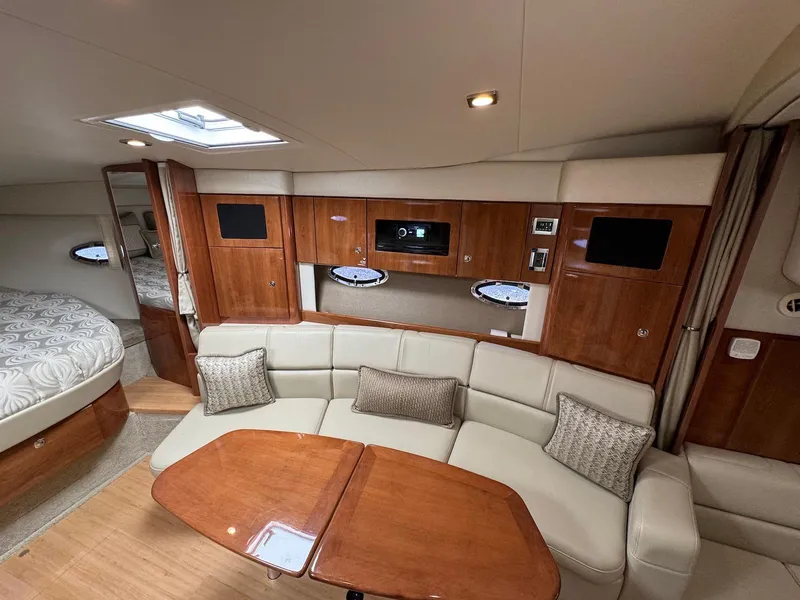 Slide: The Image of 2018 Formula 34 PC yacht interior with elegant seating and wood finishes. - 18