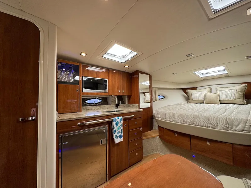 Slide: The Image of Luxurious interior of a 2018 Formula 34 PC yacht with kitchen and cozy sleeping area. - 20