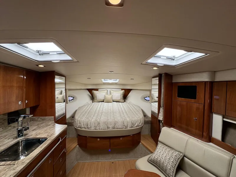 Slide: The Image of 2018 Formula 34 PC yacht interior with luxurious bed and modern amenities. - 24