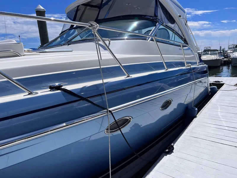 Slide: The Image of 2018 Formula 34 PC yacht docked at marina under clear blue sky. - 5