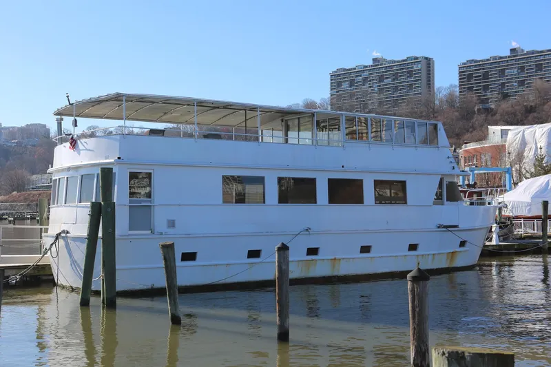 The Image of Custom 1988 Winston Knauss 64 dinner or party boat docked at marina. - 0