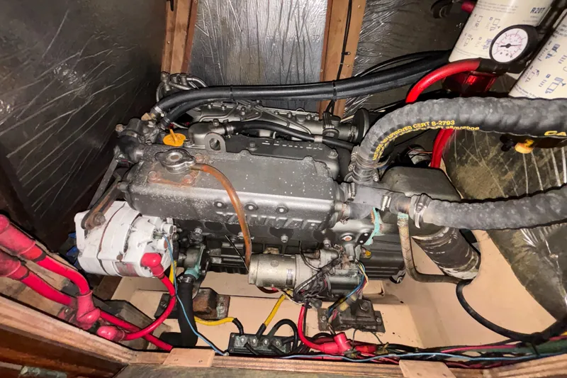 Slide: The Image of Engine compartment of a 1987 Island Packet 38 sailboat. - 49