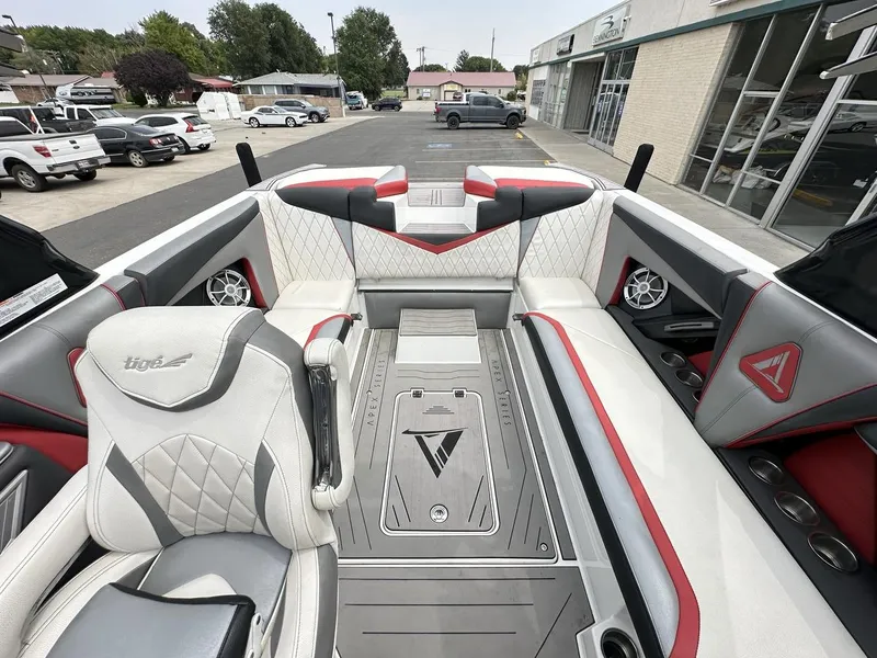 Slide: The Image of 2014 Tigé ASR boat interior with luxurious seating and modern design elements. - 20