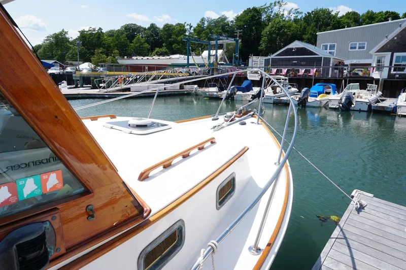 Slide: The Image of Webbers Cove 26 Pemaquid Beach boat docked at marina, sunny day, 2000 model. - 8