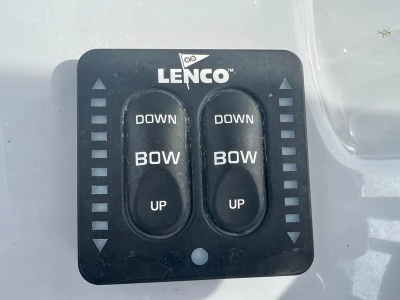 Slide: The Image of Lenco trim tab control panel on 2023 Trophy T24CC boat. - 19