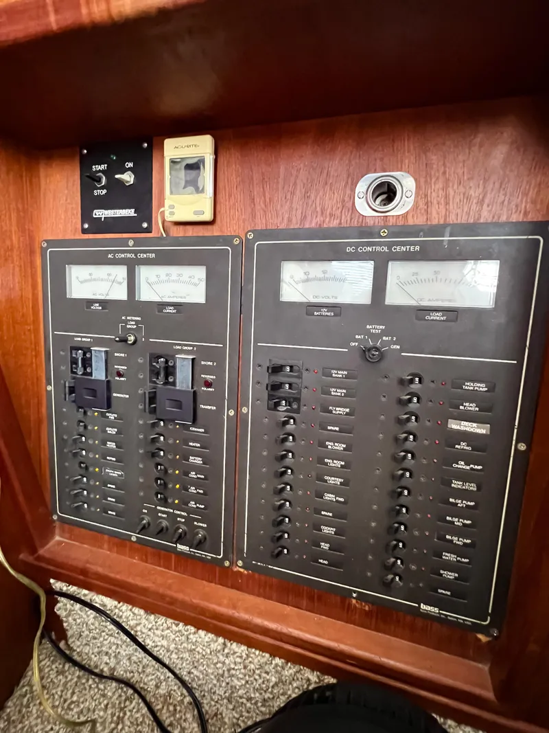 Slide: The Image of Electrical control panel of a 1987 Tollycraft 34 Sport Sedan boat. - 28