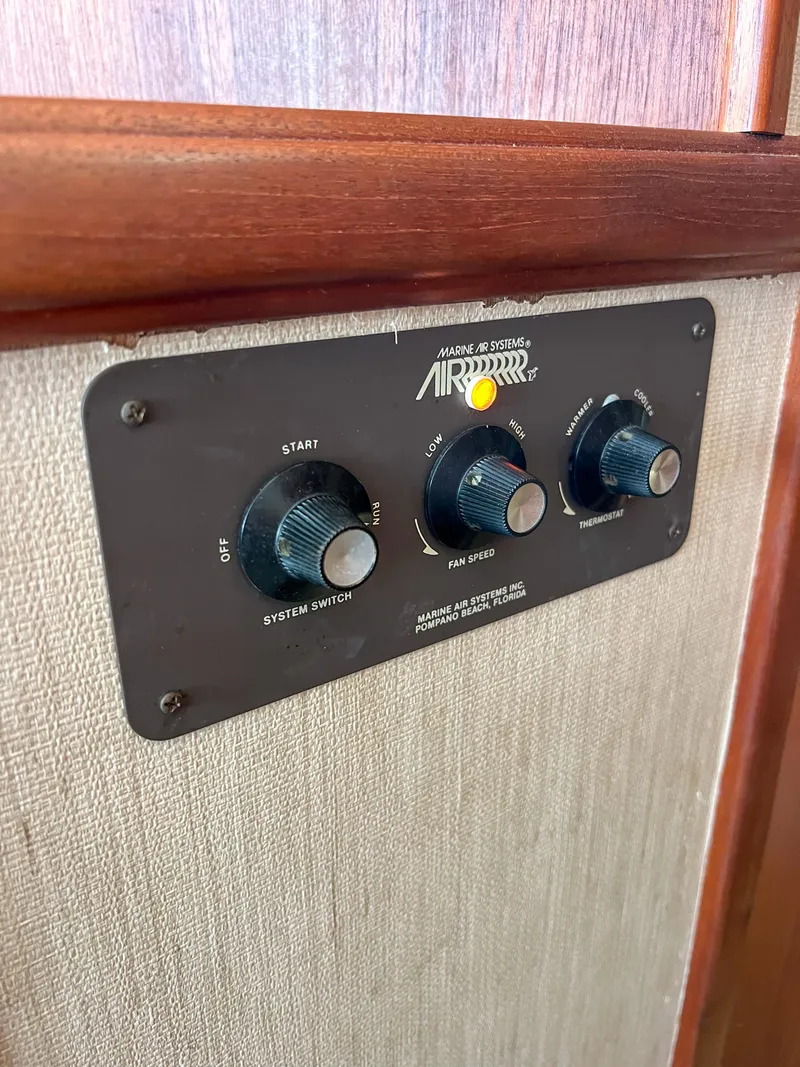 Slide: The Image of Control panel on 1987 Tollycraft 34 Sport Sedan boat interior. - 49