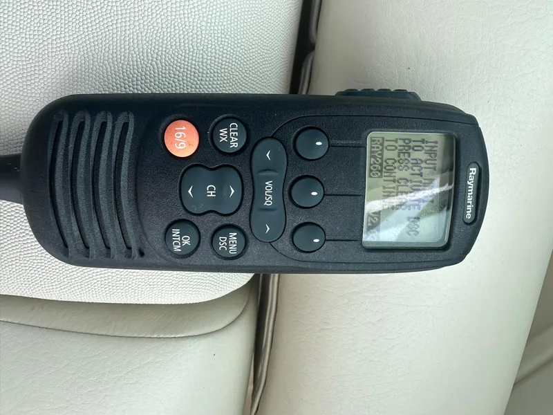 Slide: The Image of Raymarine marine radio on a 2016 Boston Whaler 315 Conquest boat. - 24