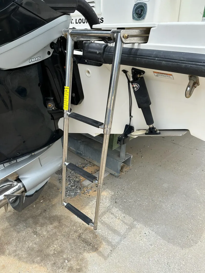 Slide: The Image of Stainless steel ladder on a 2016 Boston Whaler 315 Conquest boat. - 30