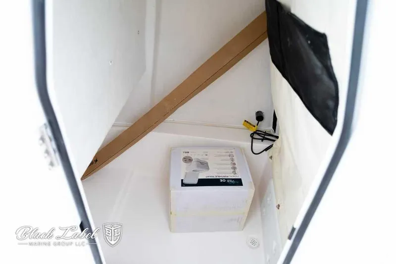 Slide: The Image of Interior storage compartment of 2025 Sea Fox 228 Commander Center Console boat. - 12
