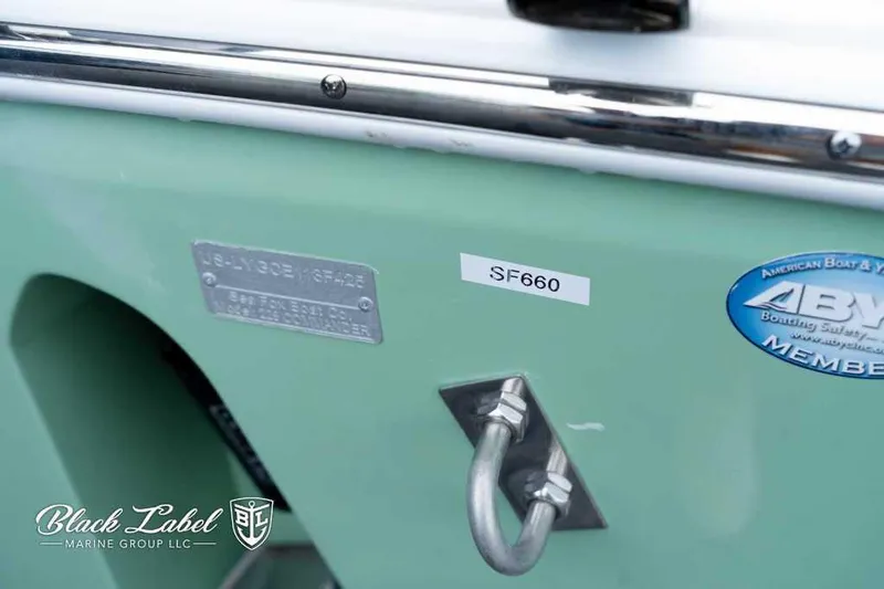 Slide: The Image of 2025 Sea Fox 228 Commander Center Console boat detail with ABYC member sticker. - 5