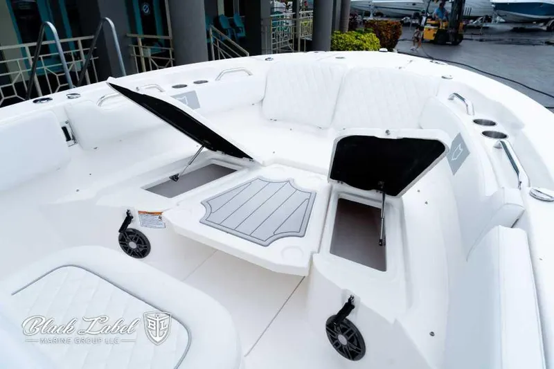 Slide: The Image of 2025 Sea Fox 228 Commander Center Console boat interior with open storage compartments. - 8