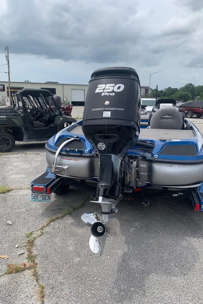 Slide: The Image of 2017 Nitro Z21 Pro boat with 250 Pro engine on trailer. - 2