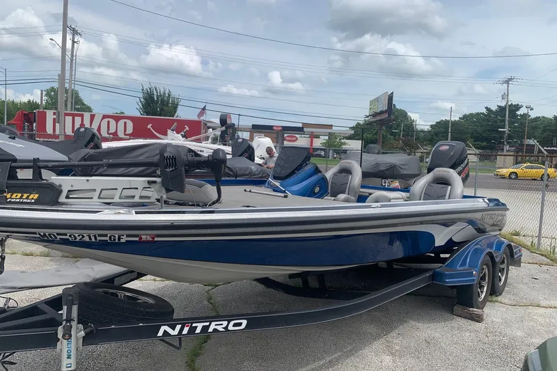 Slide: The Image of 2017 Nitro Z21 Pro boat on trailer in parking lot. - 3
