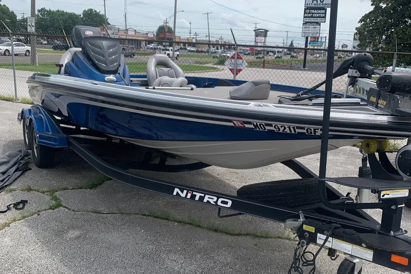 Slide: The Image of 2017 Nitro Z21 Pro fishing boat on trailer in parking lot. - 5