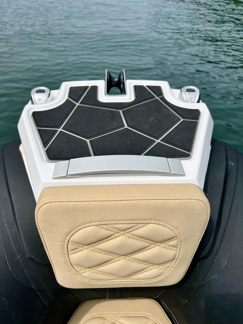 Slide: The Image of 2024 Highfield SP 600 RIB boat seat with quilted design and geometric deck pattern. - 22