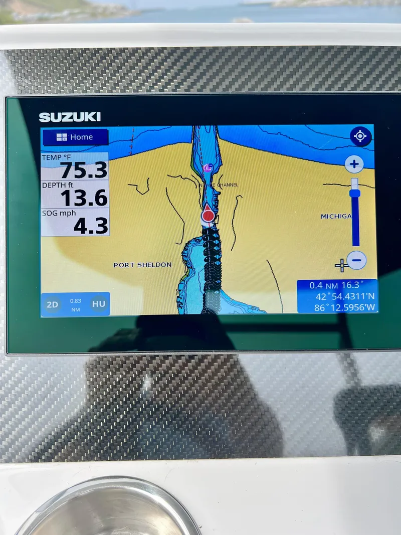 Slide: The Image of 2024 Highfield SP 600 RIB navigation display showing map, temperature, depth, and speed data. - 24