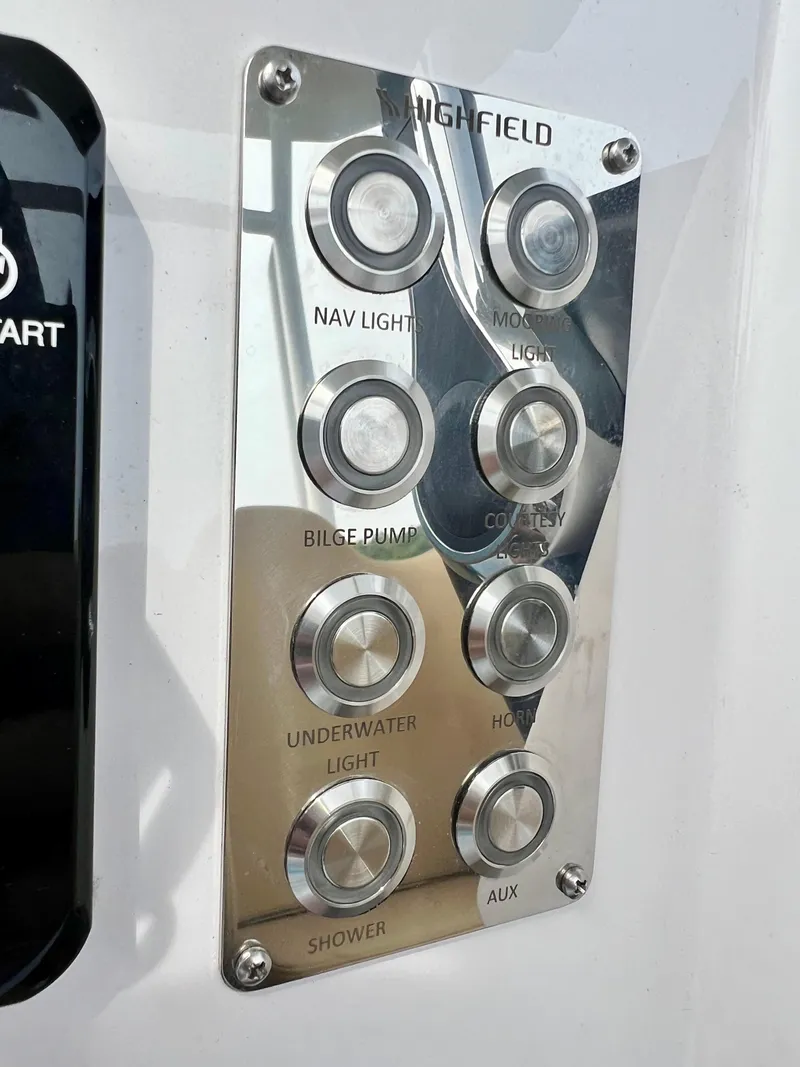 Slide: The Image of Control panel of 2024 Highfield SP 600 RIB with labeled buttons for various functions. - 28