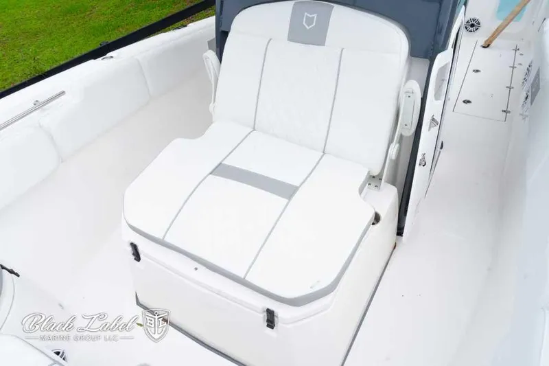 Slide: The Image of 2025 Sea Fox 288 Commander Center Console, white seating area detail. - 13