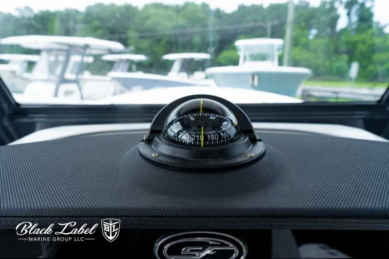 Slide: The Image of Compass on 2025 Sea Fox 288 Commander Center Console dashboard, Black Label Marine Group. - 21