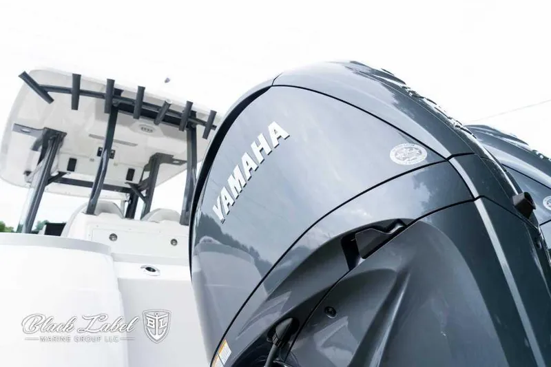 Slide: The Image of 2025 Sea Fox 288 Commander Center Console with Yamaha engine, sleek design. - 4
