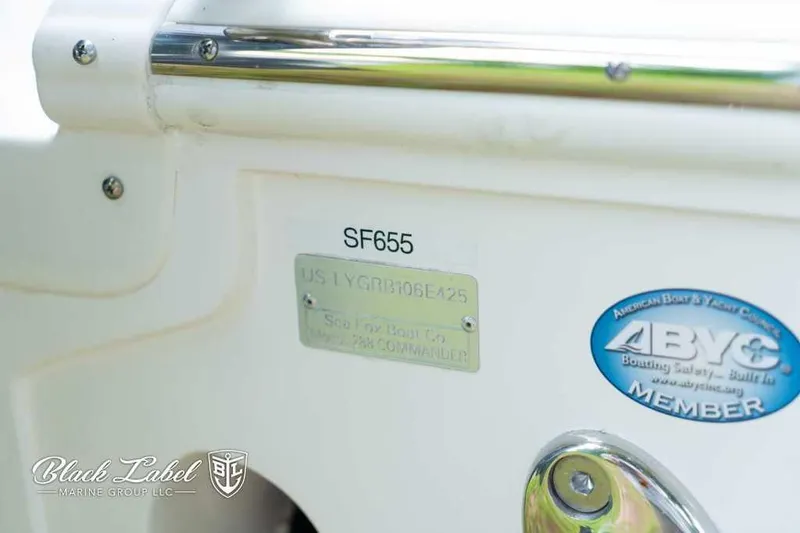 Slide: The Image of 2025 Sea Fox 288 Commander Center Console boat identification and ABYC member sticker. - 5