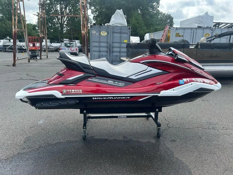 Slide: The Image of 2019 Yamaha WaveRunner FX SVHO in red, parked outdoors on a stand. - 5