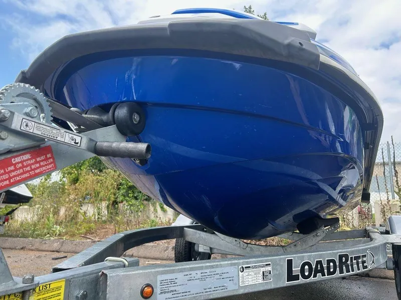 Slide: The Image of 2017 Yamaha WaveRunner GP1800 on Load Rite trailer, blue hull, parked outdoors. - 9