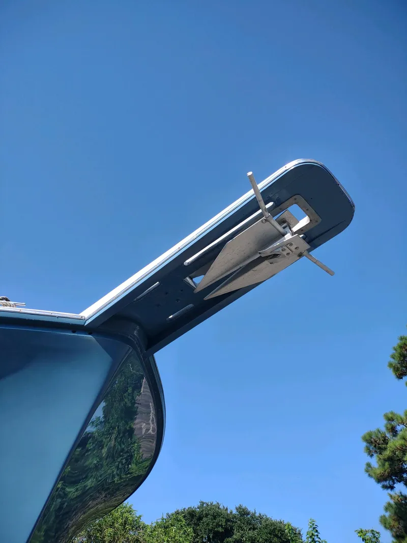 Slide: The Image of 1987 Ocean Yachts 44 Super Sport bow with anchor against clear blue sky. - 21