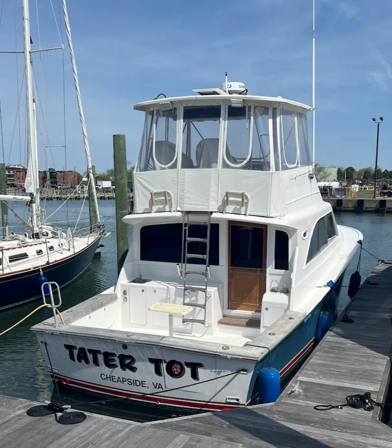 Slide: The Image of 1987 Ocean Yachts Super Sport docked, named "Tater Tot," in Cheapside, VA marina. - 34