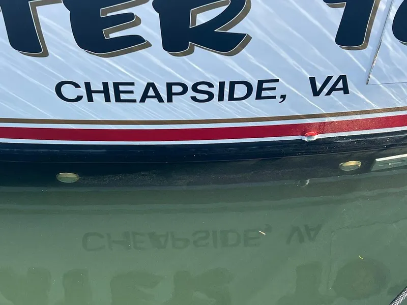 Slide: The Image of 1987 Ocean Yachts Super Sport boat with "Cheapside, VA" text on hull. - 38